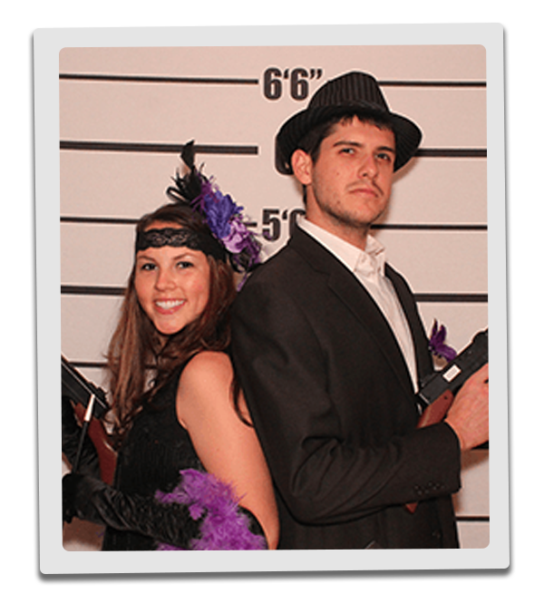 New Jersey Murder Mystery party guests pose for mugshots